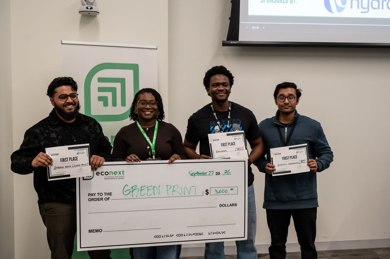 The Greenprint team holding the first place cheque at the Econext Ideathon
